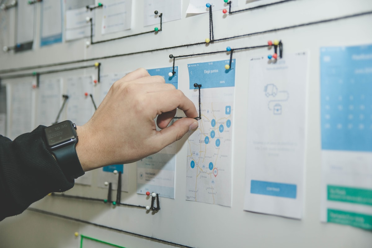Planning cards arranged on a wall while mapping out a campaign